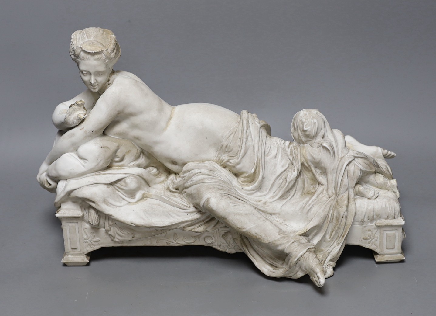 A 19th century French biscuit porcelain reclining figure, perhaps Pauline, 41cm long